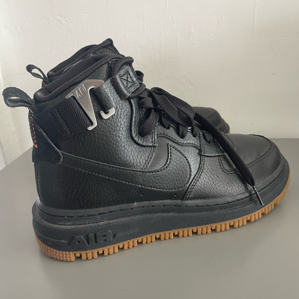 Nike Black Leather High-Tops with Gum Soles